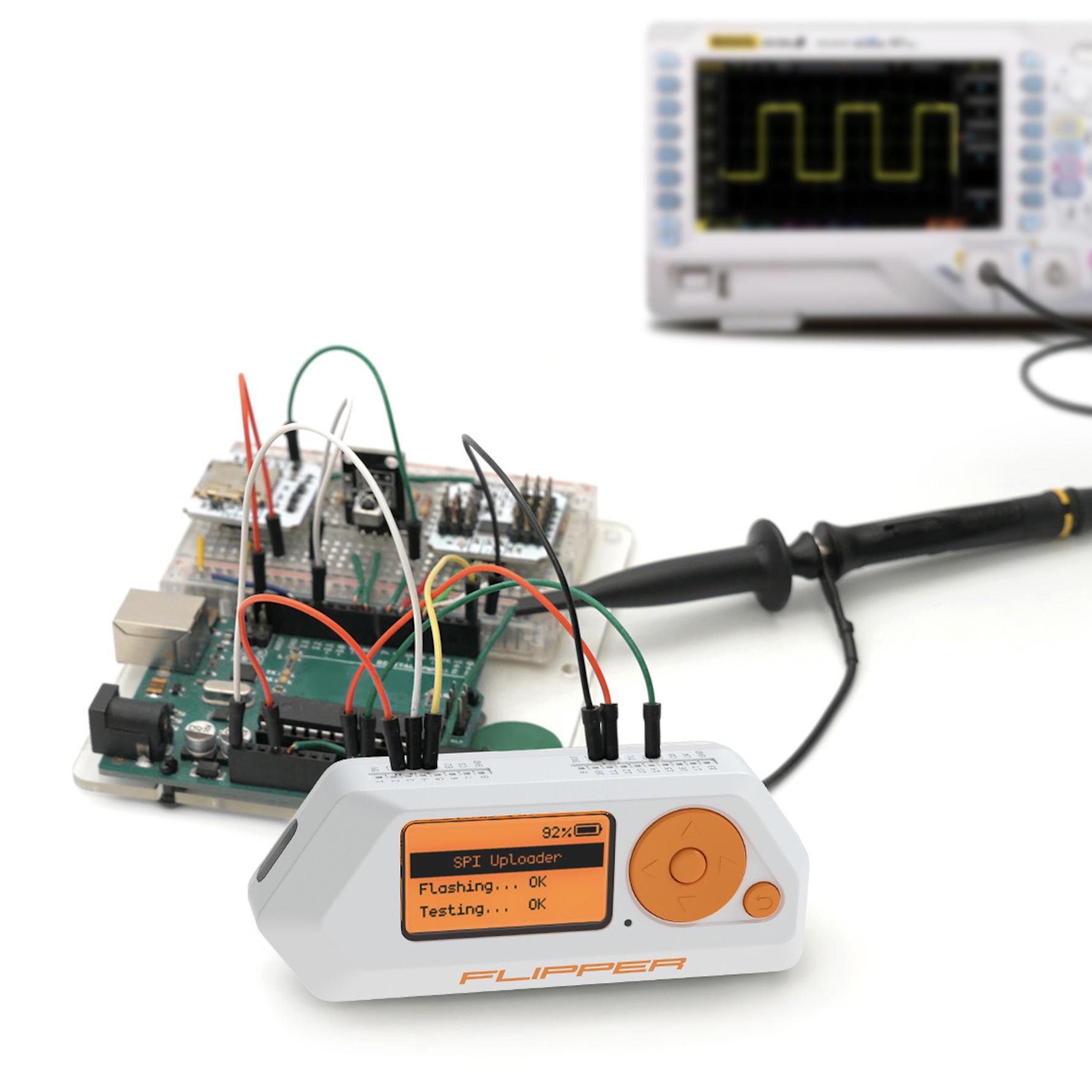 Flipper Zero being used with GPIO pins and an oscillator